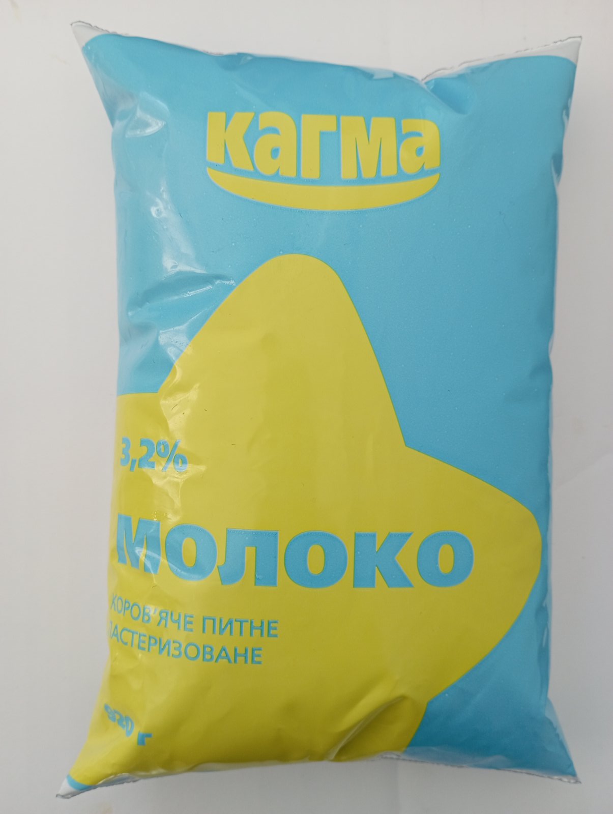 Молоко коров`яче питне пастеризоване 3,2% жиру, плівка 920г КАГМА